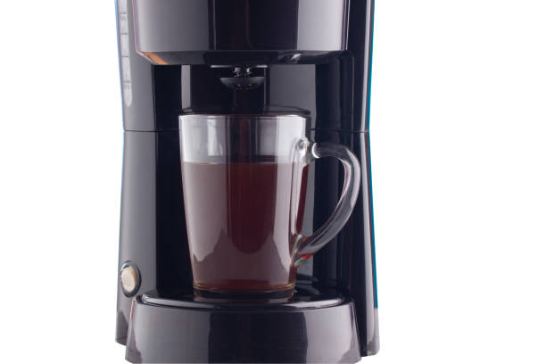 istock coffee machine with a coffee mug on a white background 1296722411