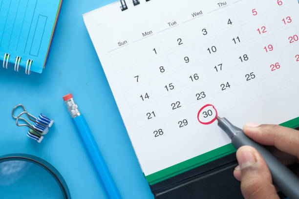 istock deadline concept with red mark on calendar date 1296723683