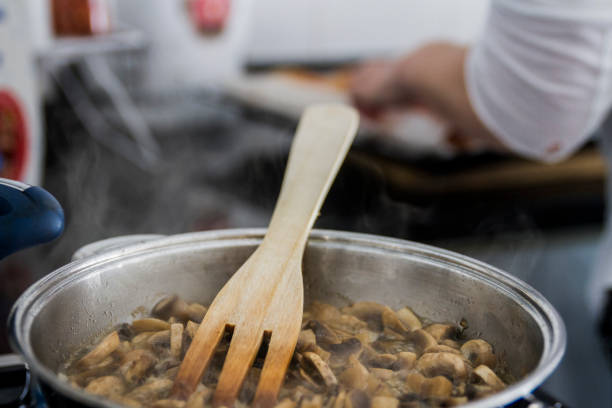 Mushrooms Cooked On The Stove In Kitchen
