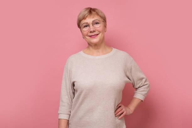 istock Happy joyful senior lady looking at camera and smiling 1296727456