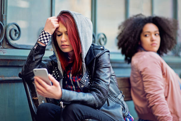 istock Girlfriends in conflict are sulking each other 1296728051