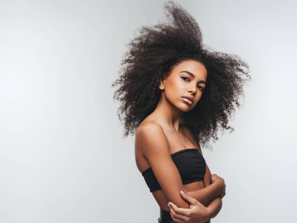 istock Beautiful girl with curly hairstyle 1296733225