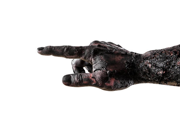 istock Creepy zombie hand isolated on white background with clipping path 1296734347
