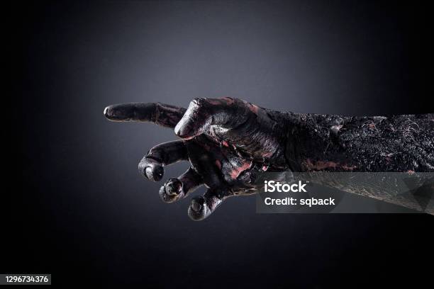 Creepy Zombie Hand Over Dark Background With Clipping Path Stock Photo - Download Image Now
