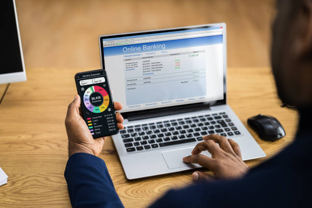 istock African American Using Online Bank Account 1296736559