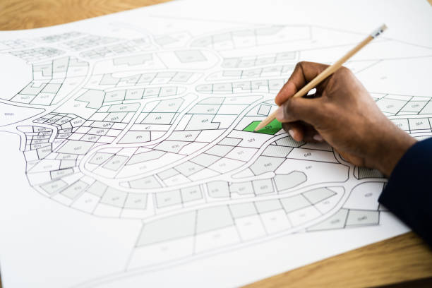 istock Land Map And Urban Building Project Plan 1296736566