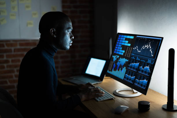 istock African Business Analyst Working Late 1296736894
