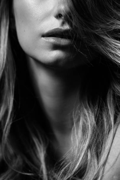 istock Part of woman's face. Woman's lips and nose. 1296737280