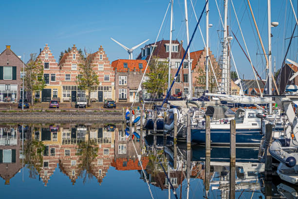 Sailing boats at the harbor of Medemblik, North Holland, Netherlands Sailing boats at the harbor of Medemblik, North Holland, Netherlands sailboat mast stock pictures, royalty-free photos & images