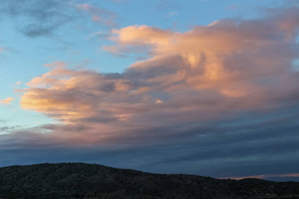 istock Beautiful view of clouds in the sky during sunset 1296738277