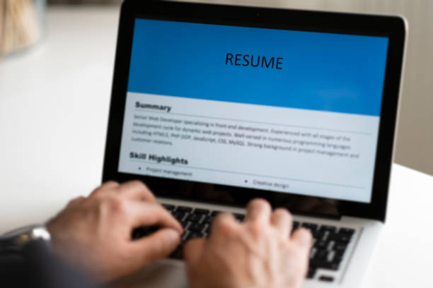 istock Business man review his resume application on desk 1296739176