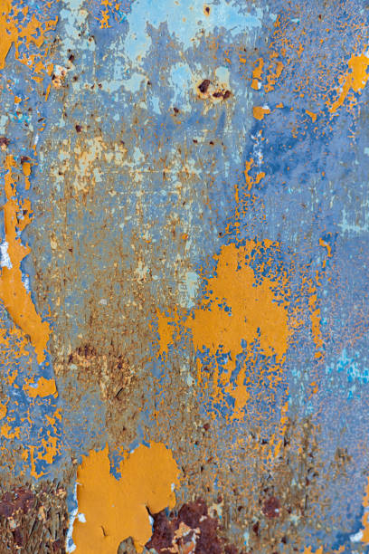 istock Rust, steel, background. Peeling off old paint. 1296742552