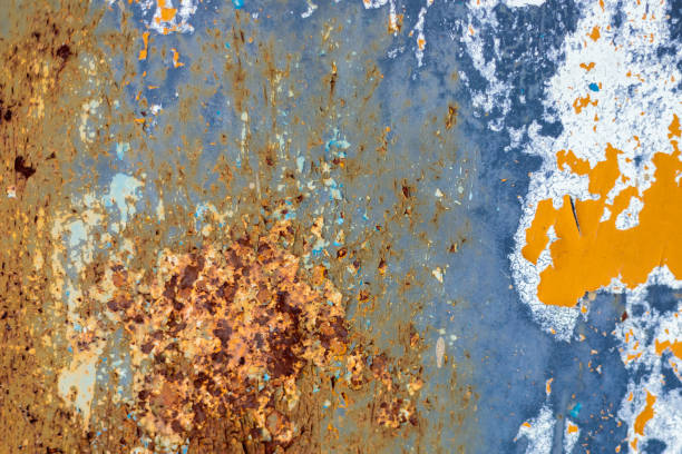 istock Rust, steel, background. Peeling off old paint. 1296742570