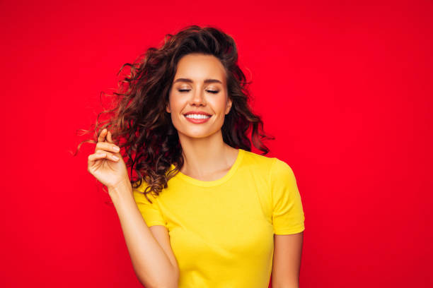 istock Attractive smiling young woman 1296744996