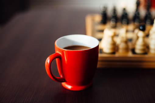 Coffee in a red cup for Chess players.