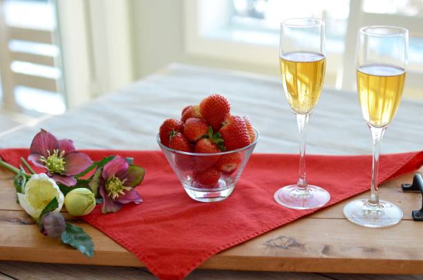 istock Valentines Day romantic champagne and strawberries 1296748193