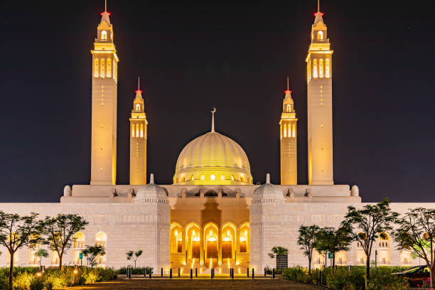 istock Night view of the Sultan Qaboos Grand Mosque. 1296752954