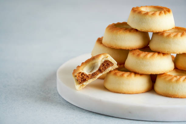 istock Traditional arabic sweets. Maamoul cookies with dates  .Close up 1296753098
