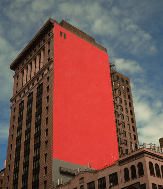 new york city building with red facade sign - architecture travel destinations vertical outdoors imagens e fotografias de stock