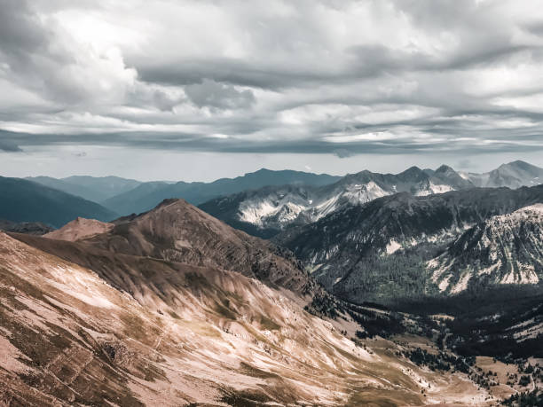 istock Mountain landscape, mountain hills and ridges under overcast skies 1296754646