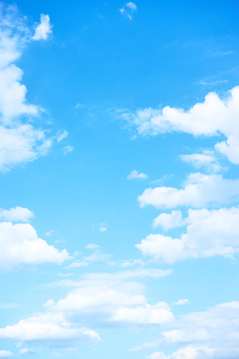 Blue sky white clouds - vertical background