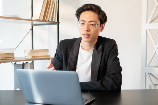 istock corporate videochat virtual meeting confident man 1296760683