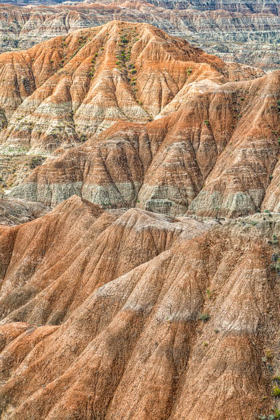 Detail of the Badlands, South Dakota Full frame view of the formations left by wind and rain of the Badlands located at Badlands National Park, South Dakota. badlands stock pictures, royalty-free photos & images