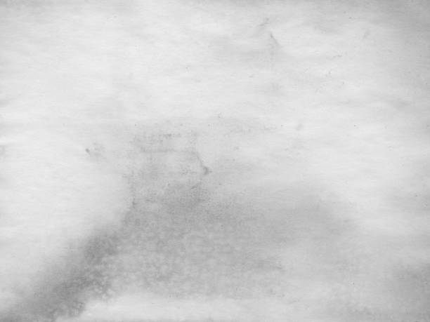 istock Dampened And Stained White Paper Grunge Texture Full Frame Background 1296762250