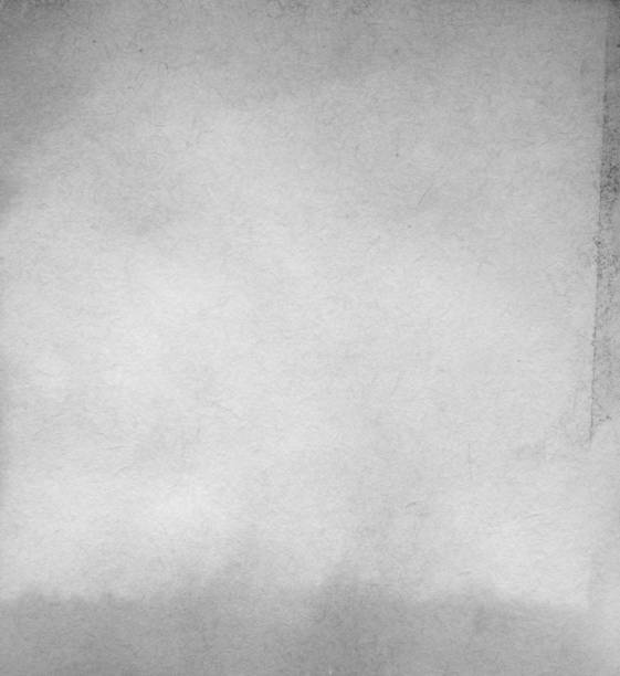 istock Stained And Damp White Paper Grunge Texture Full Frame Background 1296763861