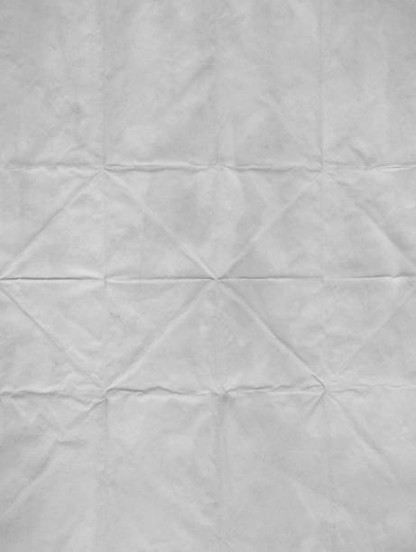 istock Stained And Damp White Paper Grunge Texture Full Frame Background 1296764636