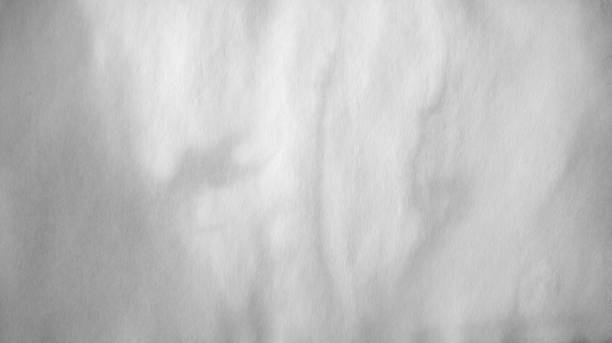 istock Stained And Damp White Paper Grunge Texture Full Frame Background 1296764750
