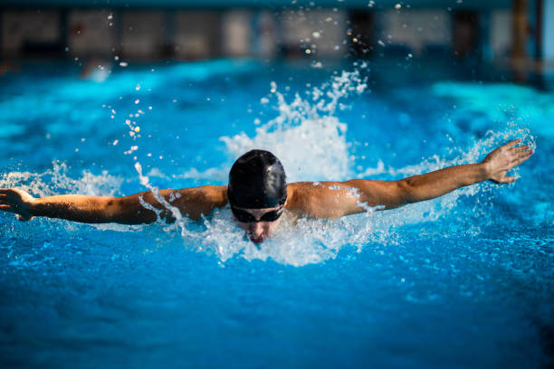 istock Butterfly stroke swimming 1296767187