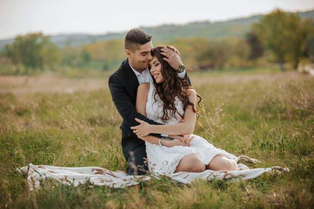 istock Loving young couple in nature 1296779757