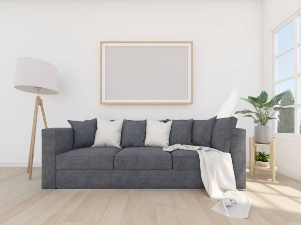 istock grey sofa in white room with ficture frame and floor lamp 1296783478