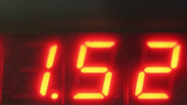 istock Electronic digital dial meter counter pipe. Manufacture of plastic water pipes factory. Process of making plastic tubes on the machine tool with the use of water and air pressure. 1296788876