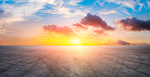 istock Race track road and sky clouds at sunset. 1296799773