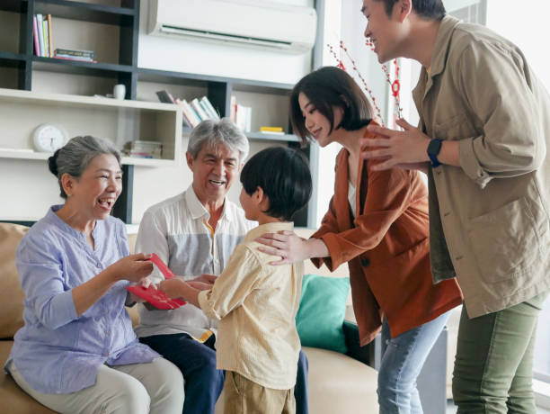 istock Giving red envelope ceremony on Chinese New Year 1296803412