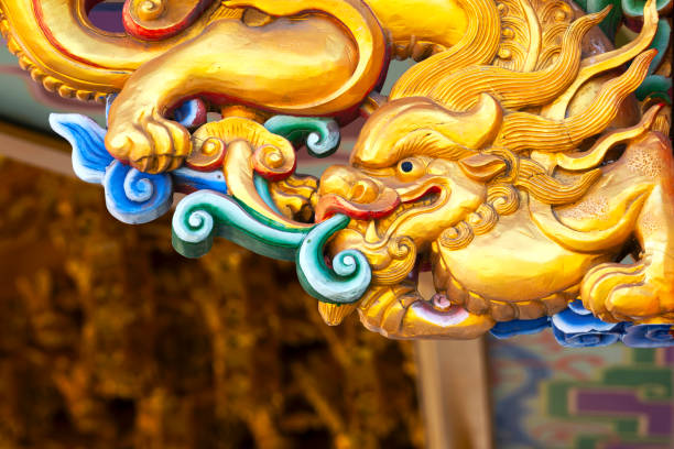 istock Dragon statue at the ancient Chinese temple in Thailand 1296804042