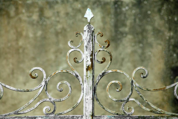 istock Detail of old rusty cast iron gate. 1296805617