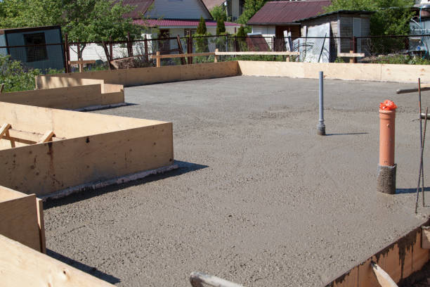 istock concrete slab of foundation with wooden formwork 1296807041