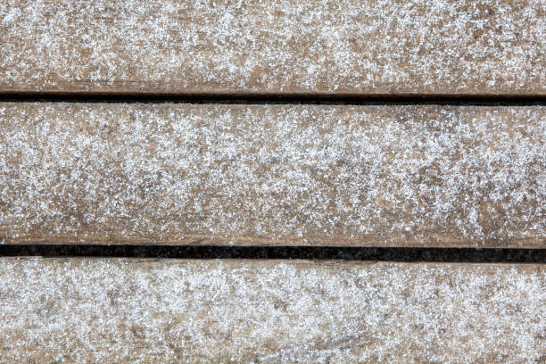 istock image of wooden desk snow 1296815078