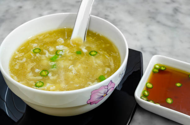 istock Hot Chicken Clear Soup with Chilli Sauce 1296816547