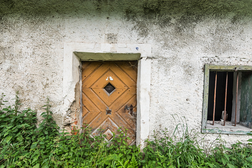 wooden door from a abandoned old house on the country