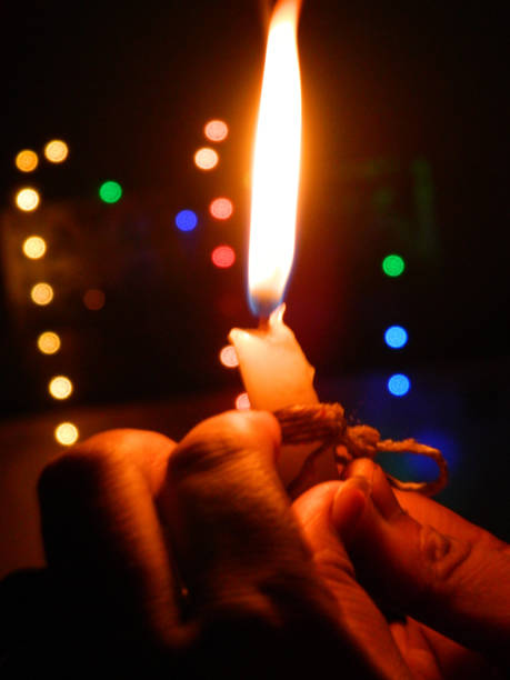 istock The candle symbolizes light in the darkness...... 1296820049