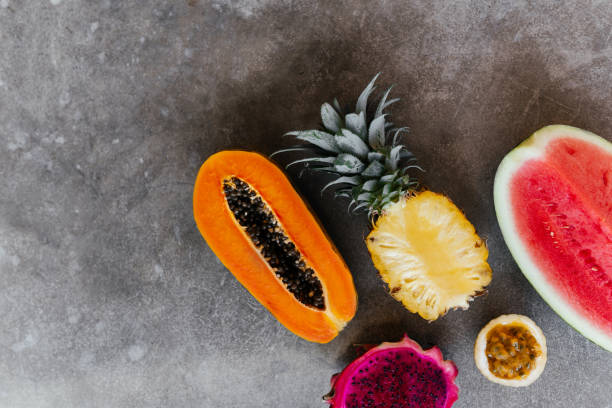 istock Fresh healthy tropical fruits, melon, pineapple, mango, dragon fruit. 1296822305