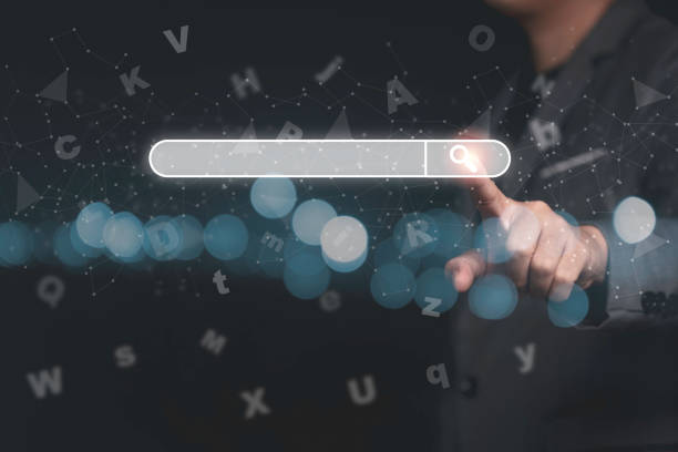 istock Businessman using finger to press a search browsing button for find information and knowledge from internet. 1296823942