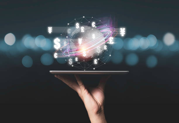 istock Global currency exchange concept, Hand holding world with virtual line effect and dollar yuan yen euro and pound sterling sign. 1296824839