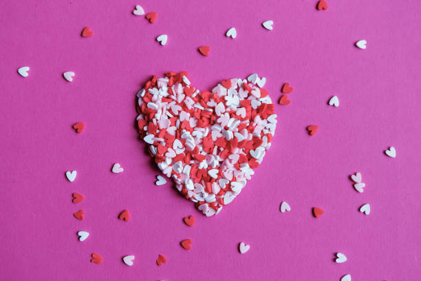 istock Pink Background with Valentine's Hearts. Abstract Wallpaper 1296831050