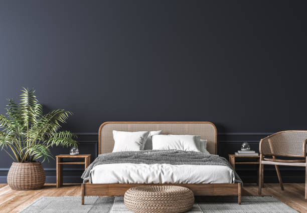 Dark bedroom interior mockup, wooden rattan bed on empty dark wall background, Scandinavian style stock photo