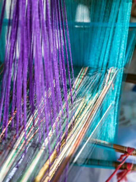istock Loom of weaving Colored threads. India Handloom Board. 1296832719
